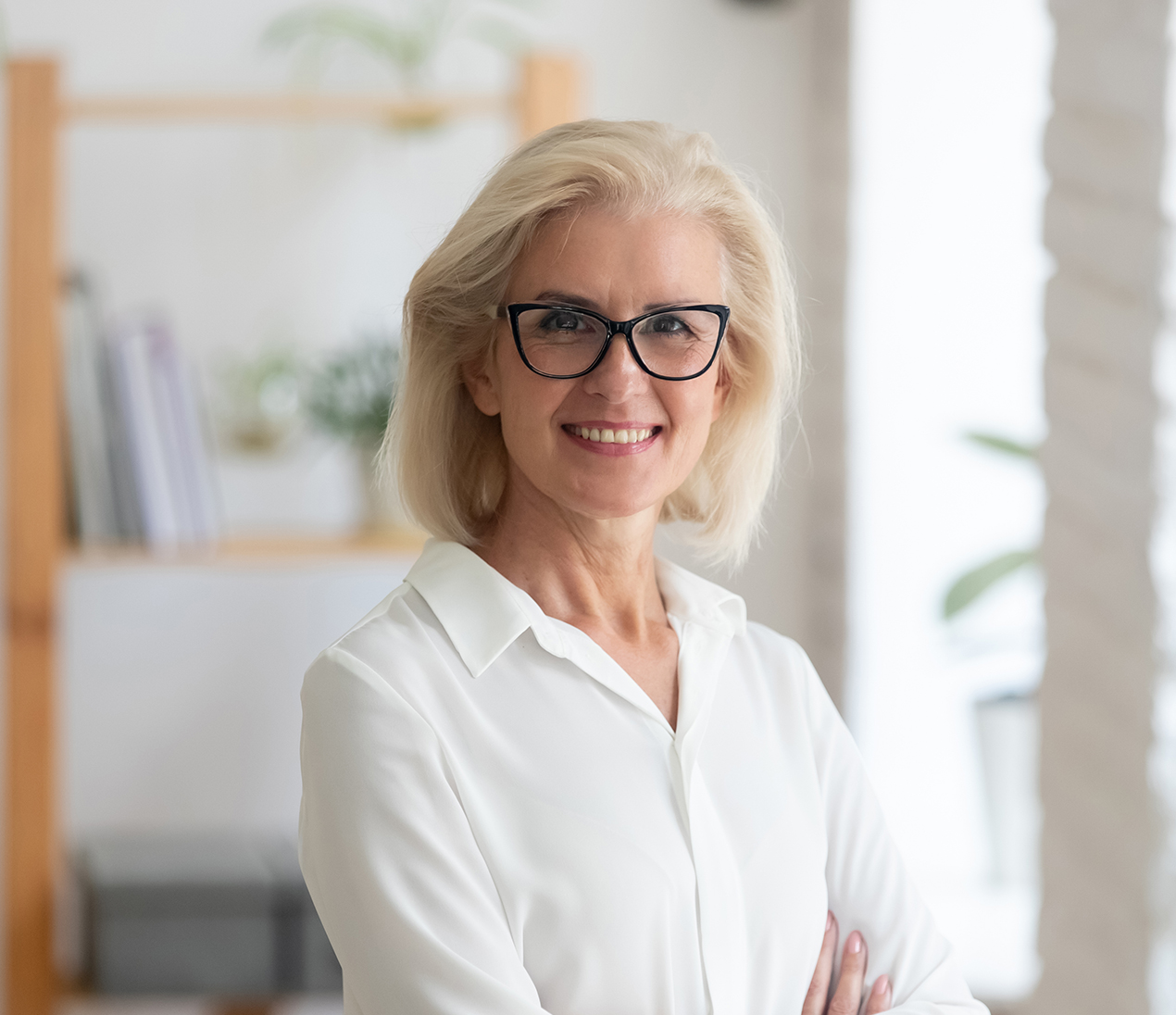 Portrait,Of,Smiling,Senior,Grey-haired,Beautiful,Businesswoman,Stand,With,Arms