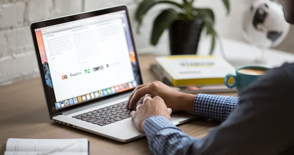 Person Using Macbook Pro