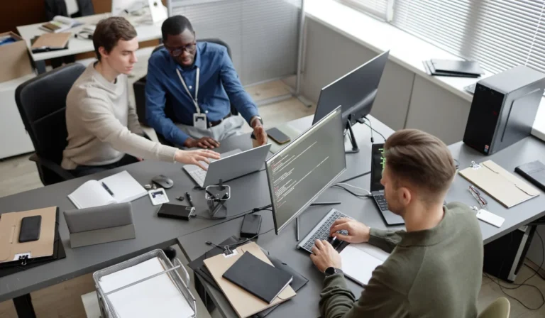 High angle shot of busy IT professionals
